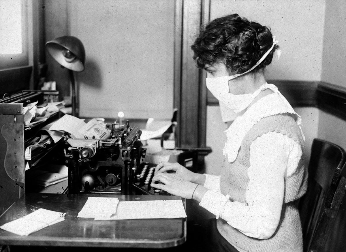 Woman working during 1918 H1N1 Pandemic