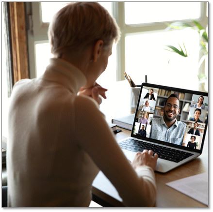 A woman attending a Zoom meeting